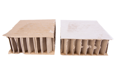 Selbstklebende Wabenpolster zum Schutz von Schaltwerk, Nabe oder Gabel sowie zum Fixieren des Fahrrades in der Verpackung.